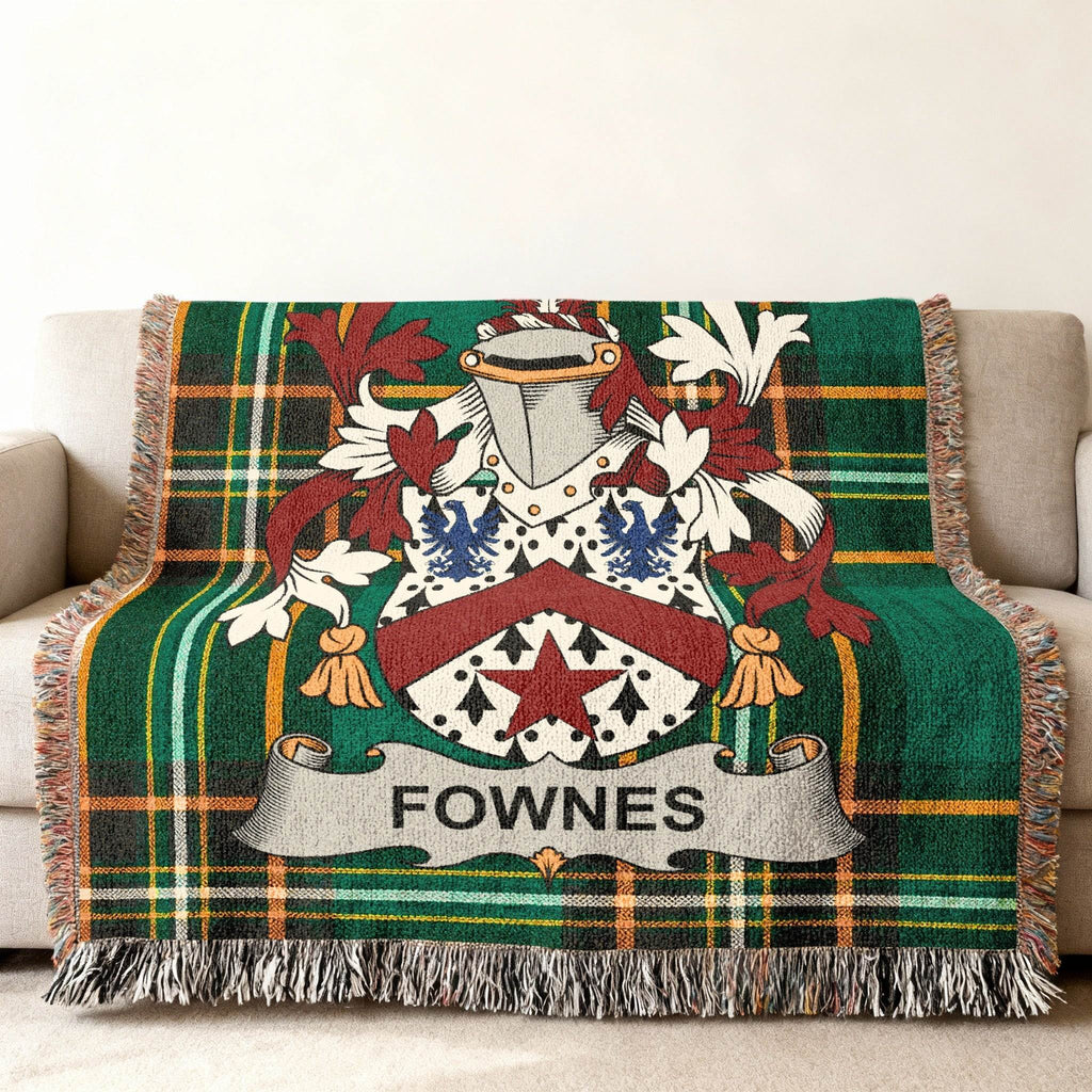 Green tartan blanket featuring the Fownes family crest.