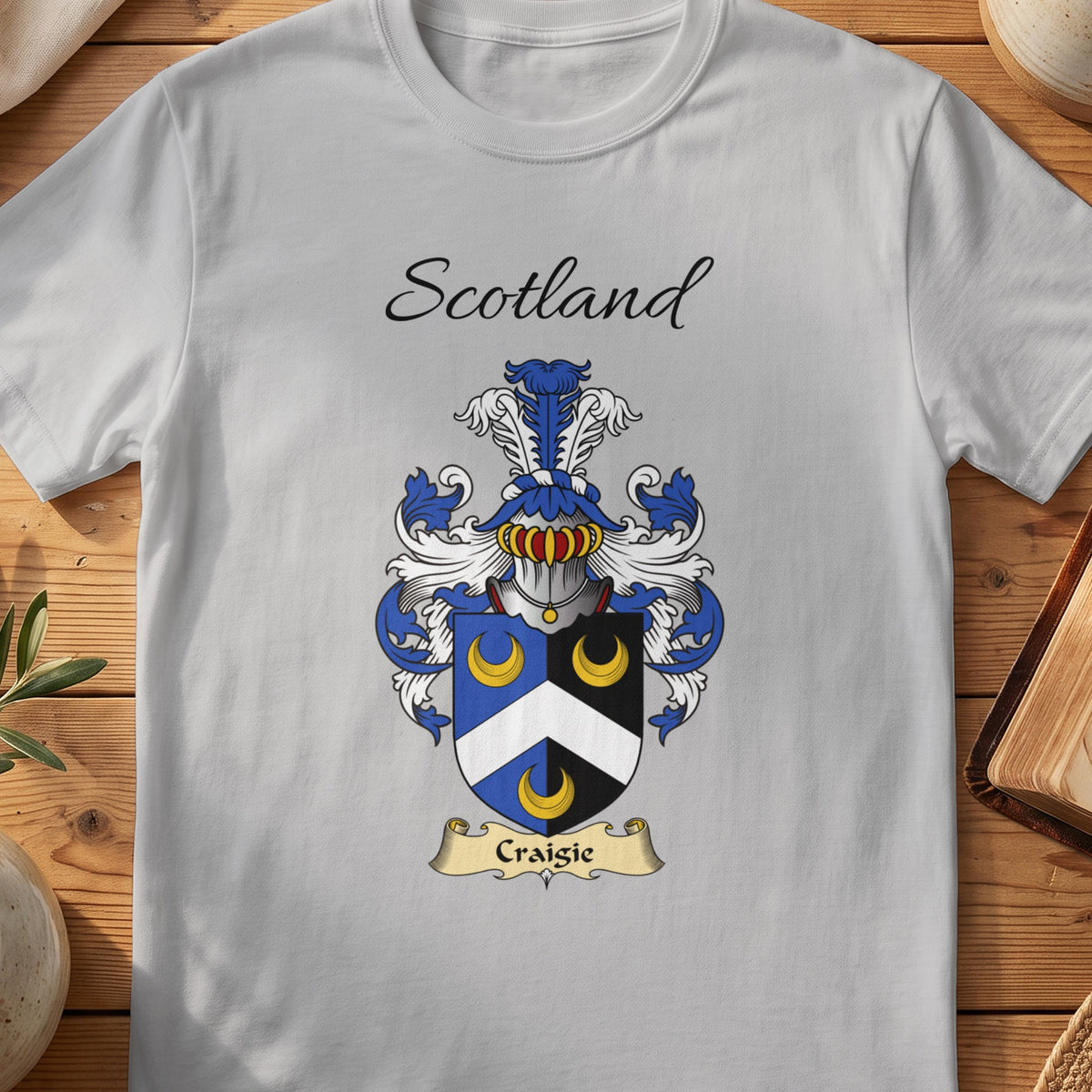 Sport Grey Craigie Scottish family shield T-shirt featuring a white chevron and gold crescents on blue and black