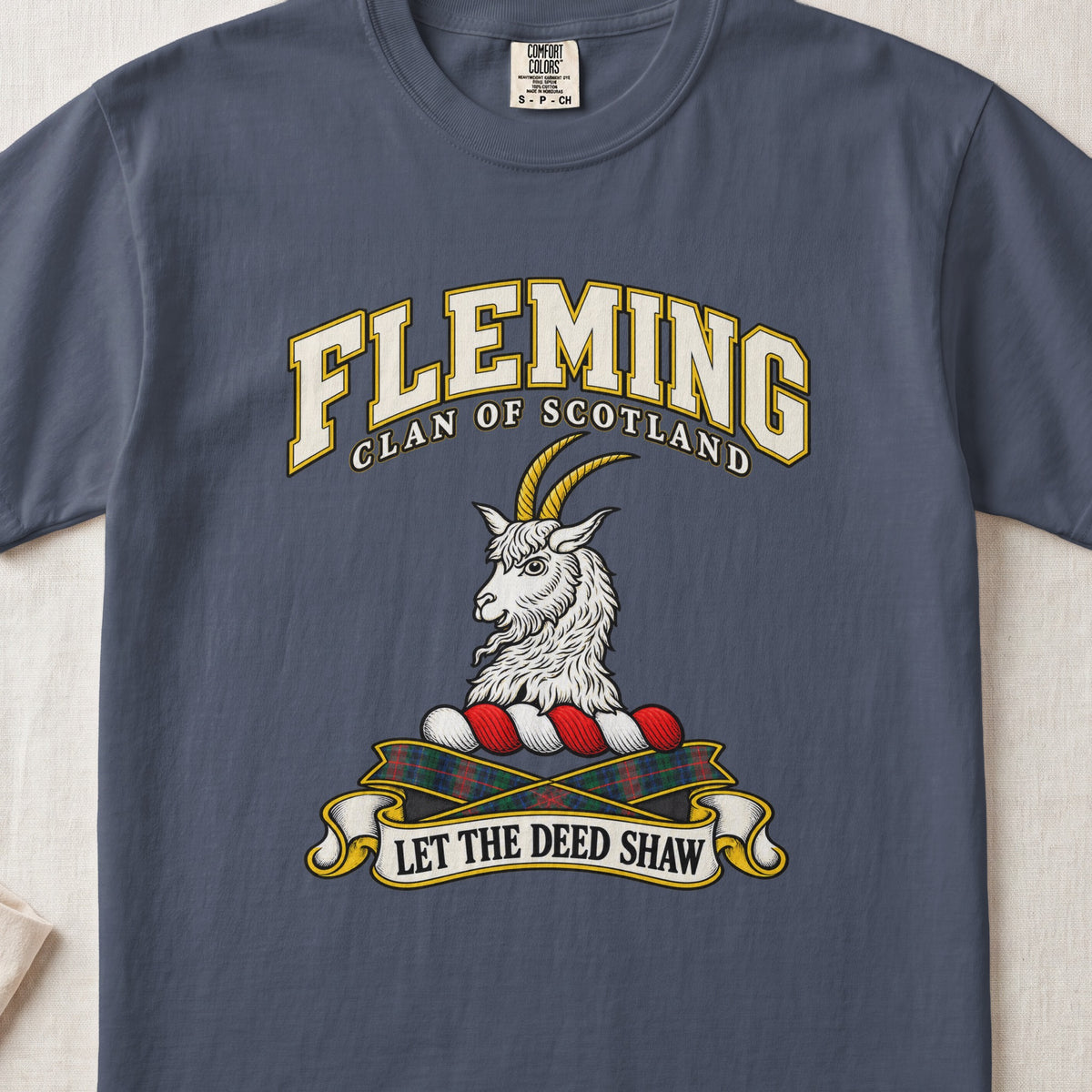 Fleming Scottish clan T-shirt in Midnight, front view with a silver goat head with golden horns and motto banner.