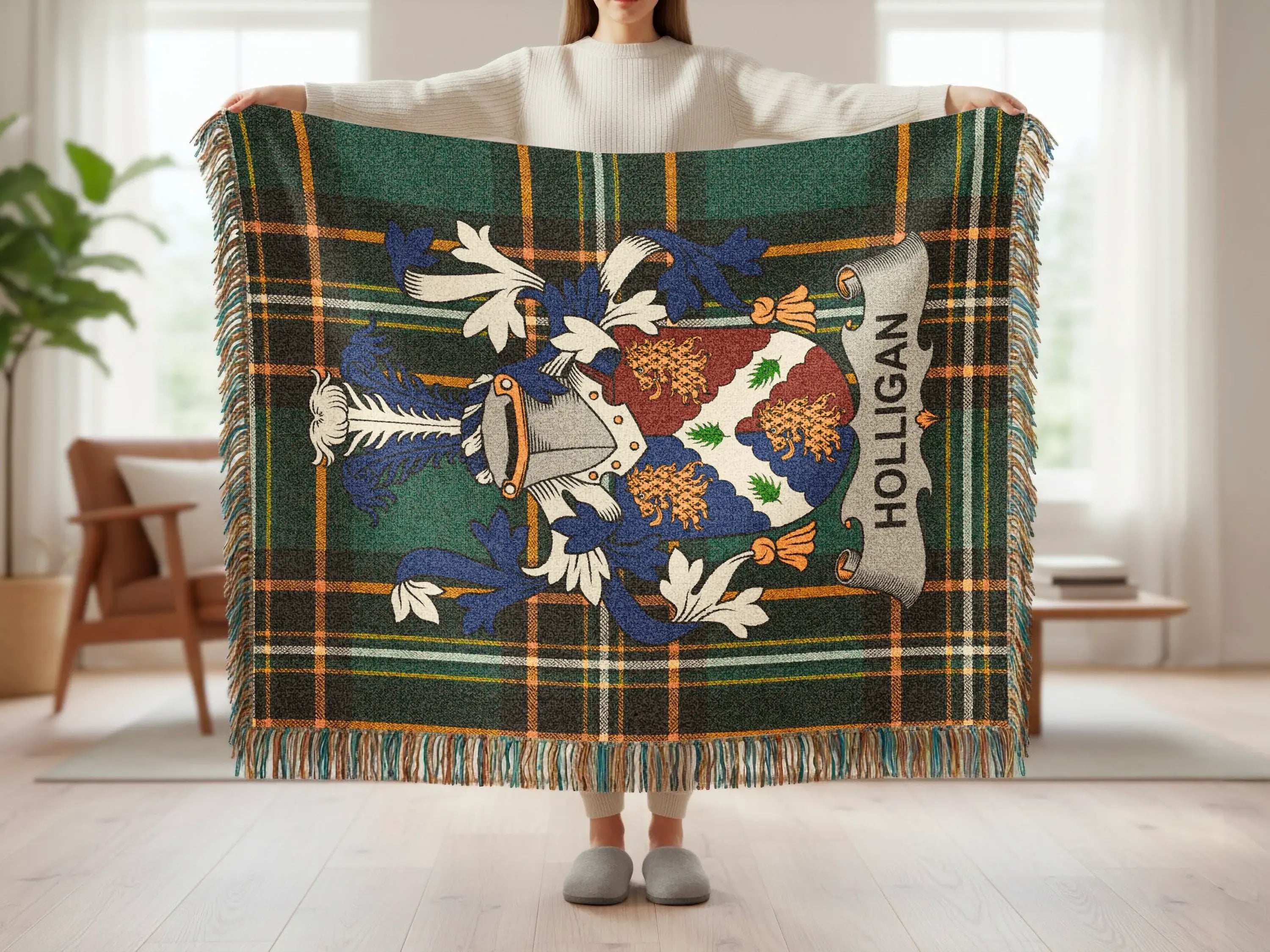 Green tartan blanket with the Holligan coat of arms displayed prominently.