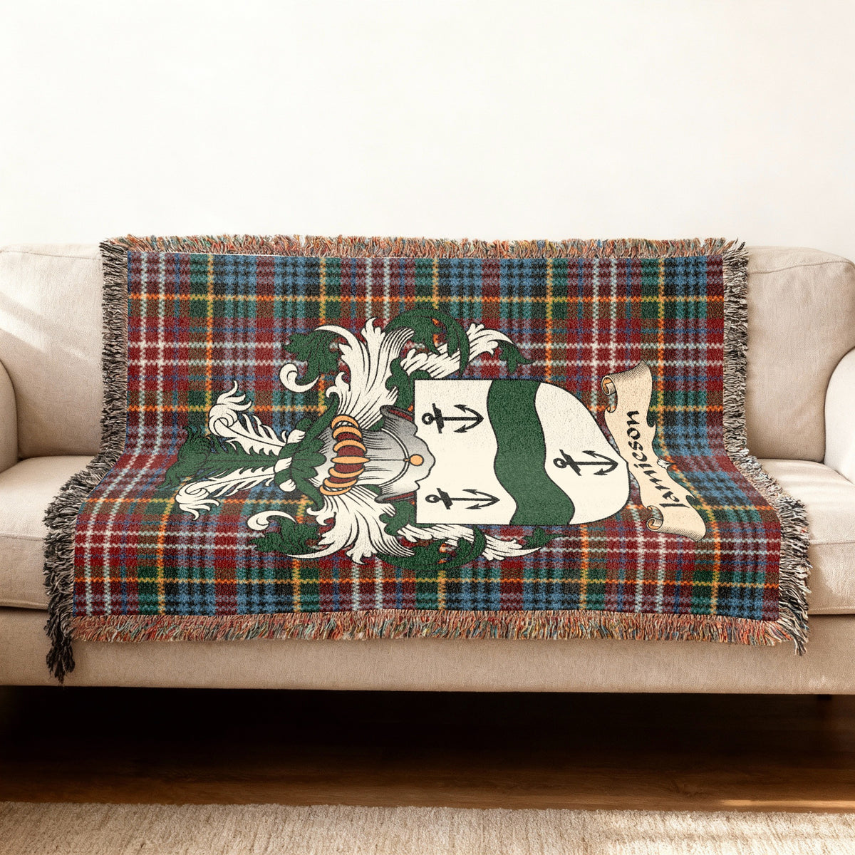 Jamieson Scottish woven blanket with family shield and Caledonia tartan background