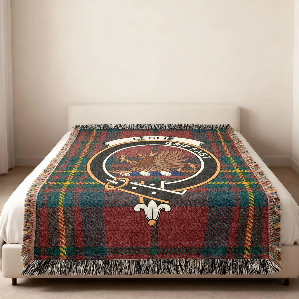 Leslie Grip Fast highland tartan woven blanket — clan crest at centre, fringe edge visible
