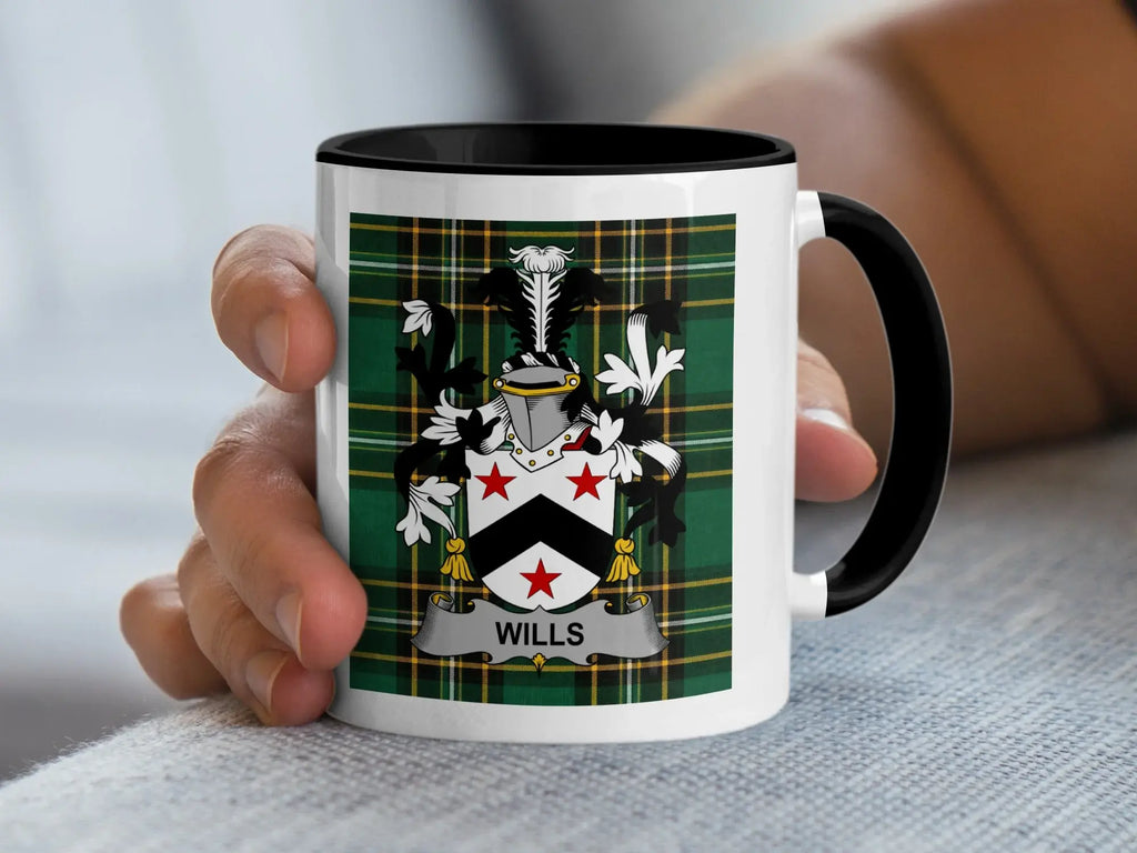 White mug with black rim featuring a tartan pattern and the surname "Wills" coat of arms.