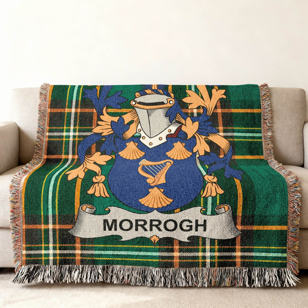 Tartan throw blanket with a blue and gold coat of arms and "MORROGH" banner.