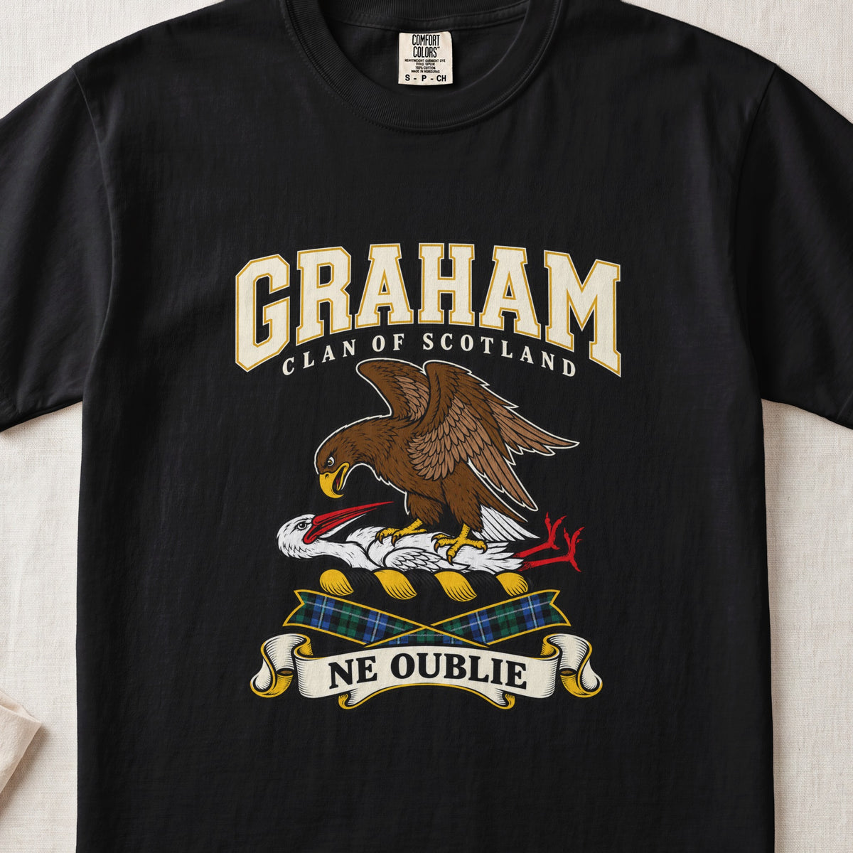 Graham graphic T-shirt in Black, front flat lay showing varsity lettering and brown eagle-like bird over a white long-necked bird with red beak and legs.