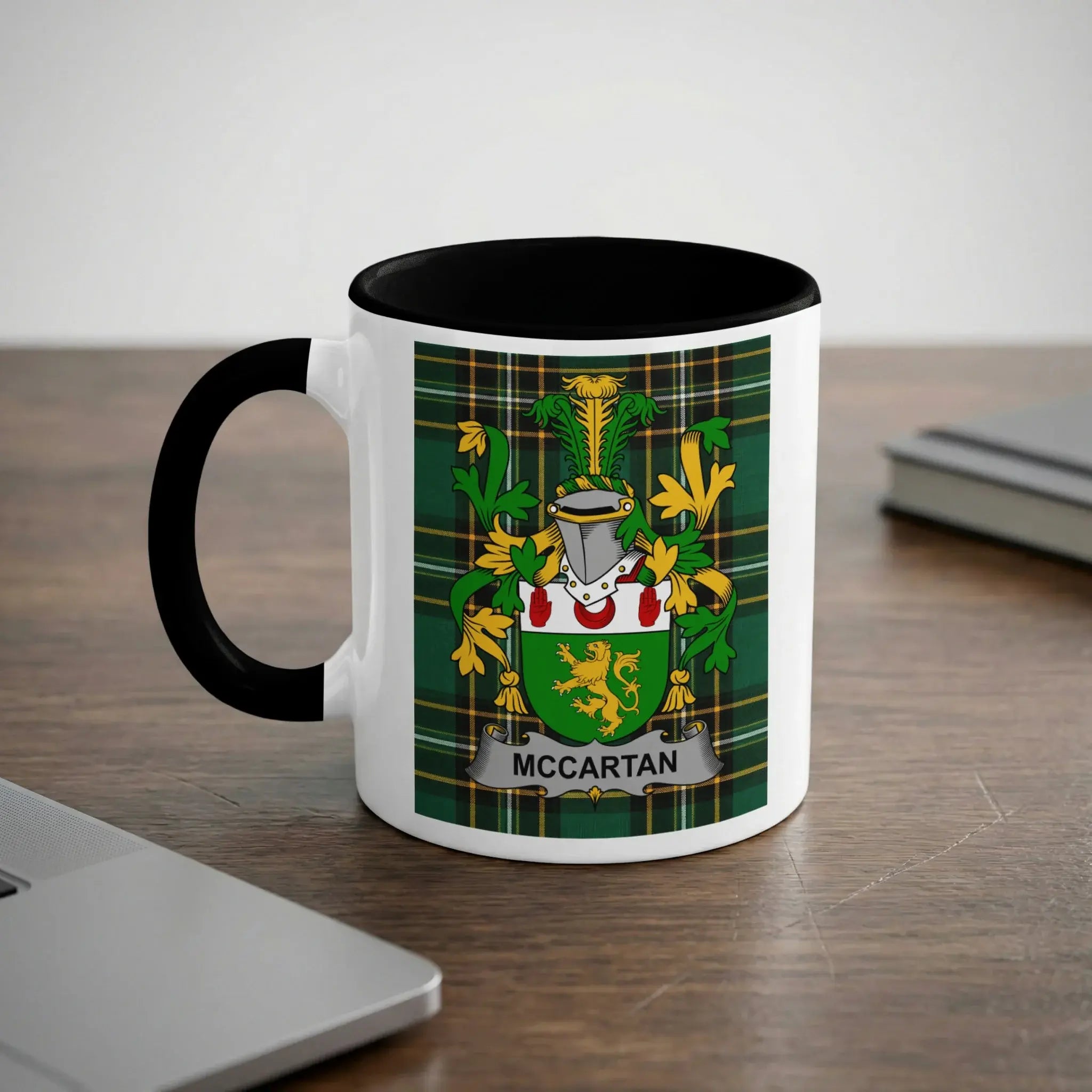 McCartan Irish heritage mug with black handle and family crest