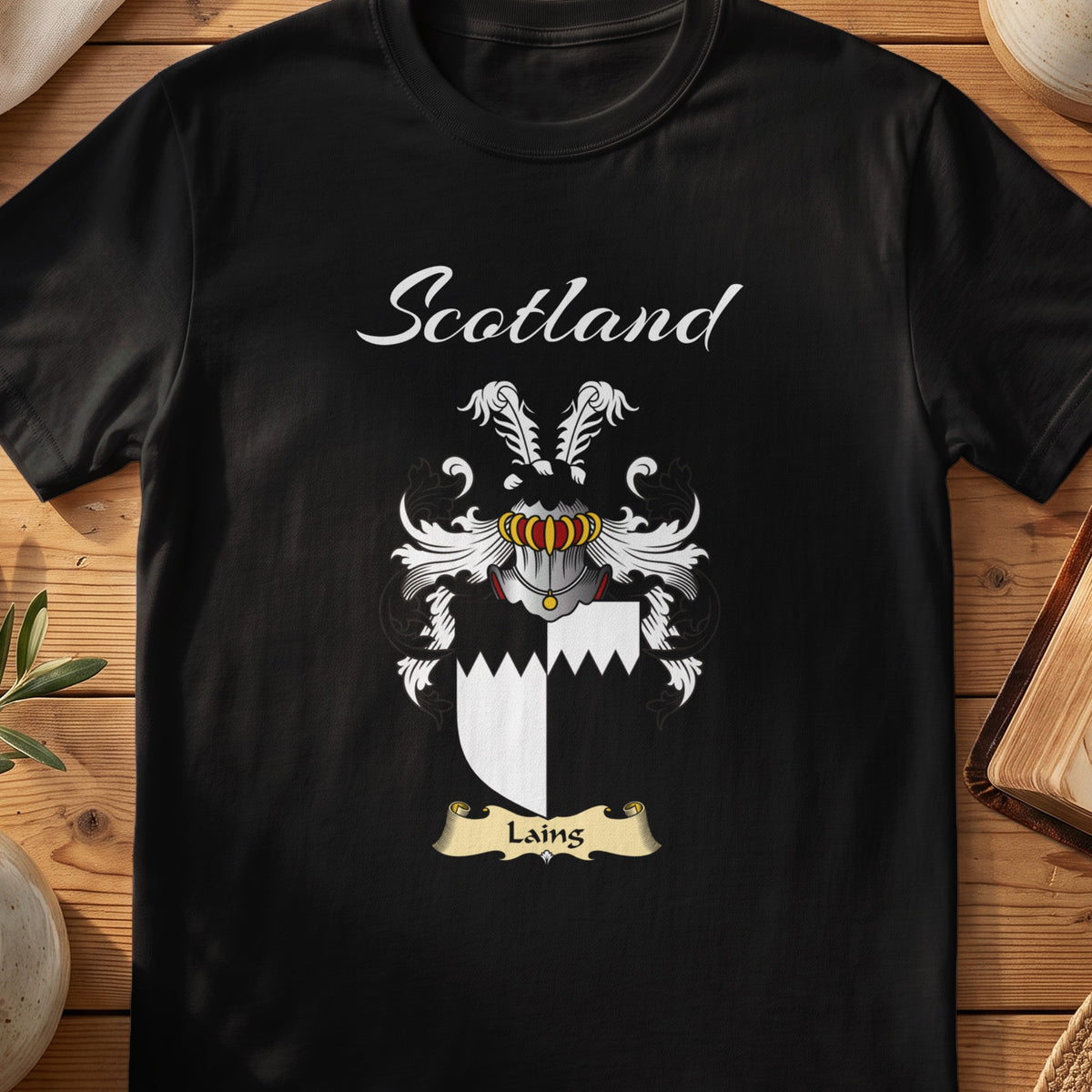 Black Laing Scottish T-shirt featuring black-and-white quarters with a jagged dividing line