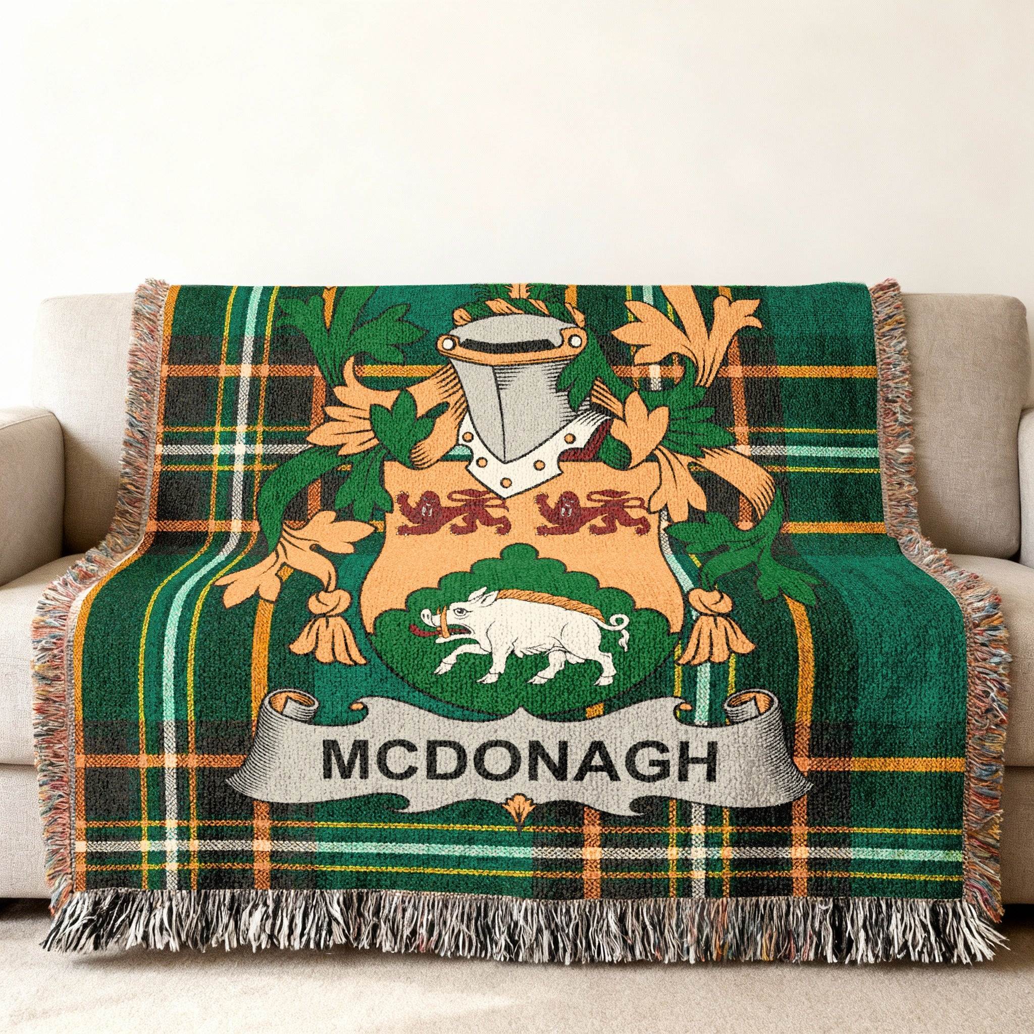 Green tartan blanket with McDonagh coat of arms.