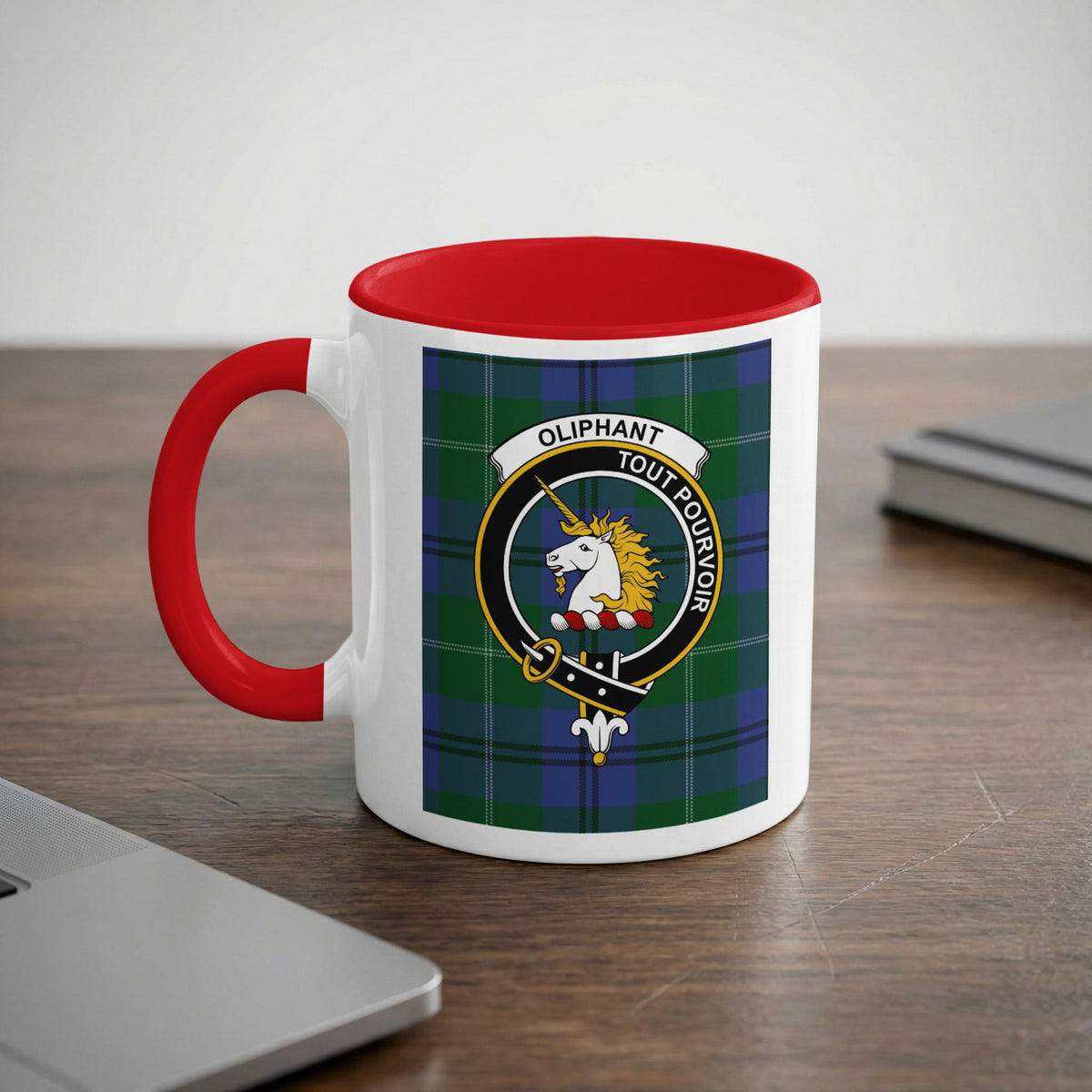 Oliphant Scottish clan crest artwork on an 11 oz red accent mug with a tartan background