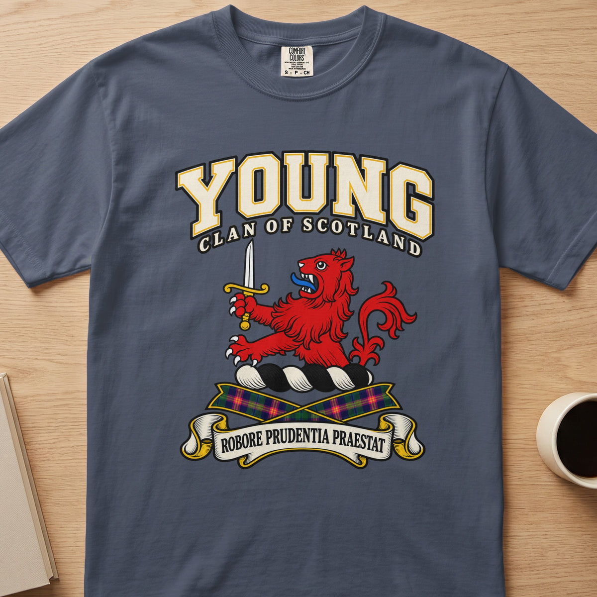 Young red lion with raised sword graphic on a slate blue Comfort Colors T-shirt, front view
