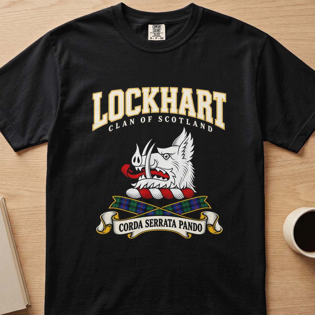 Lockhart white boar’s head and tartan ribbons graphic on a black Comfort Colors T-shirt, front view