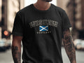 Model wearing the Black Wishaw Scotland Comfort Colors T-shirt with the Scottish Saltire