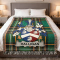 Halligan family crest on a green tartan plaid throw blanket.
