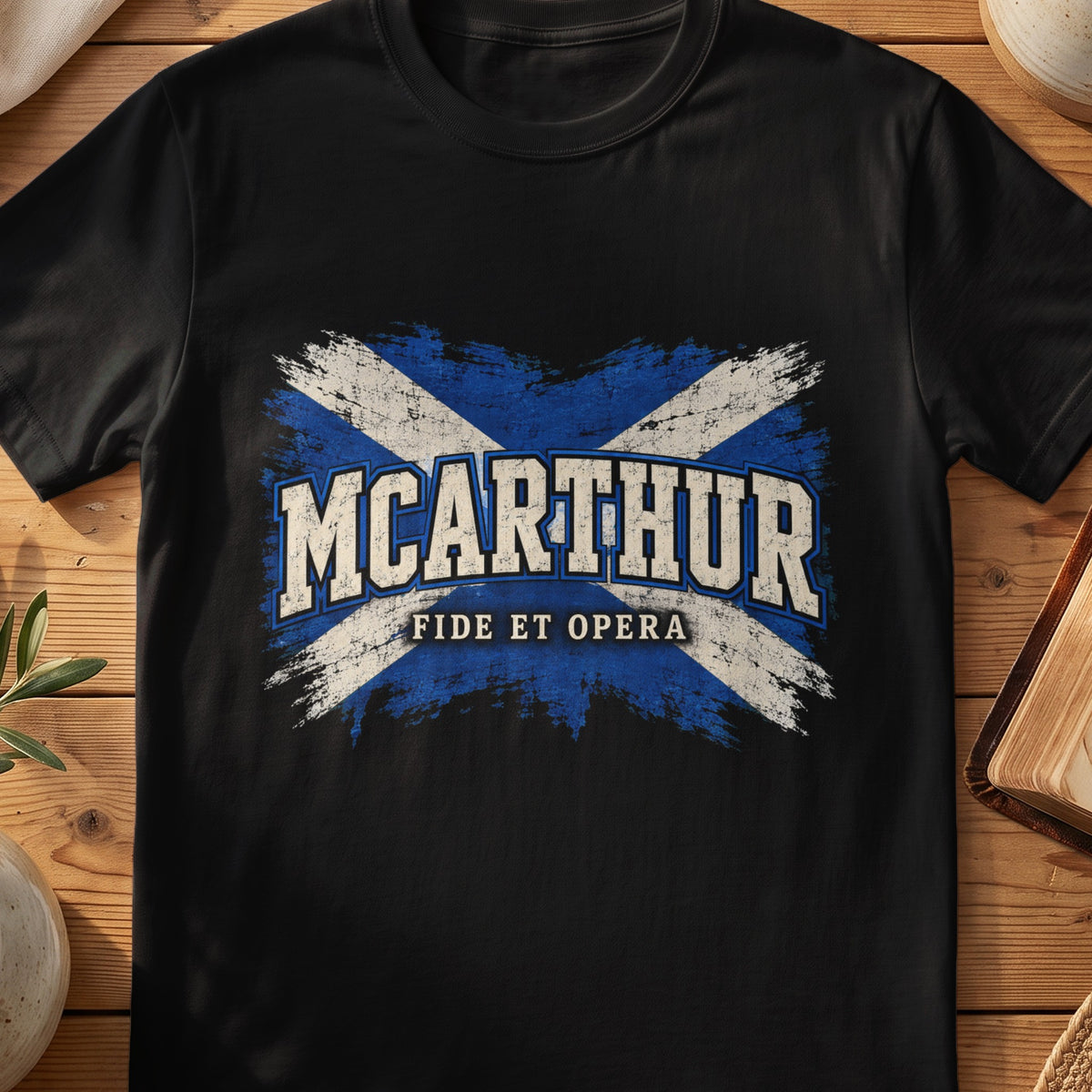 McArthur Scottish Saltire T-shirt in Black, with distressed blue and cream flag and “Fide et Opera” lettering.