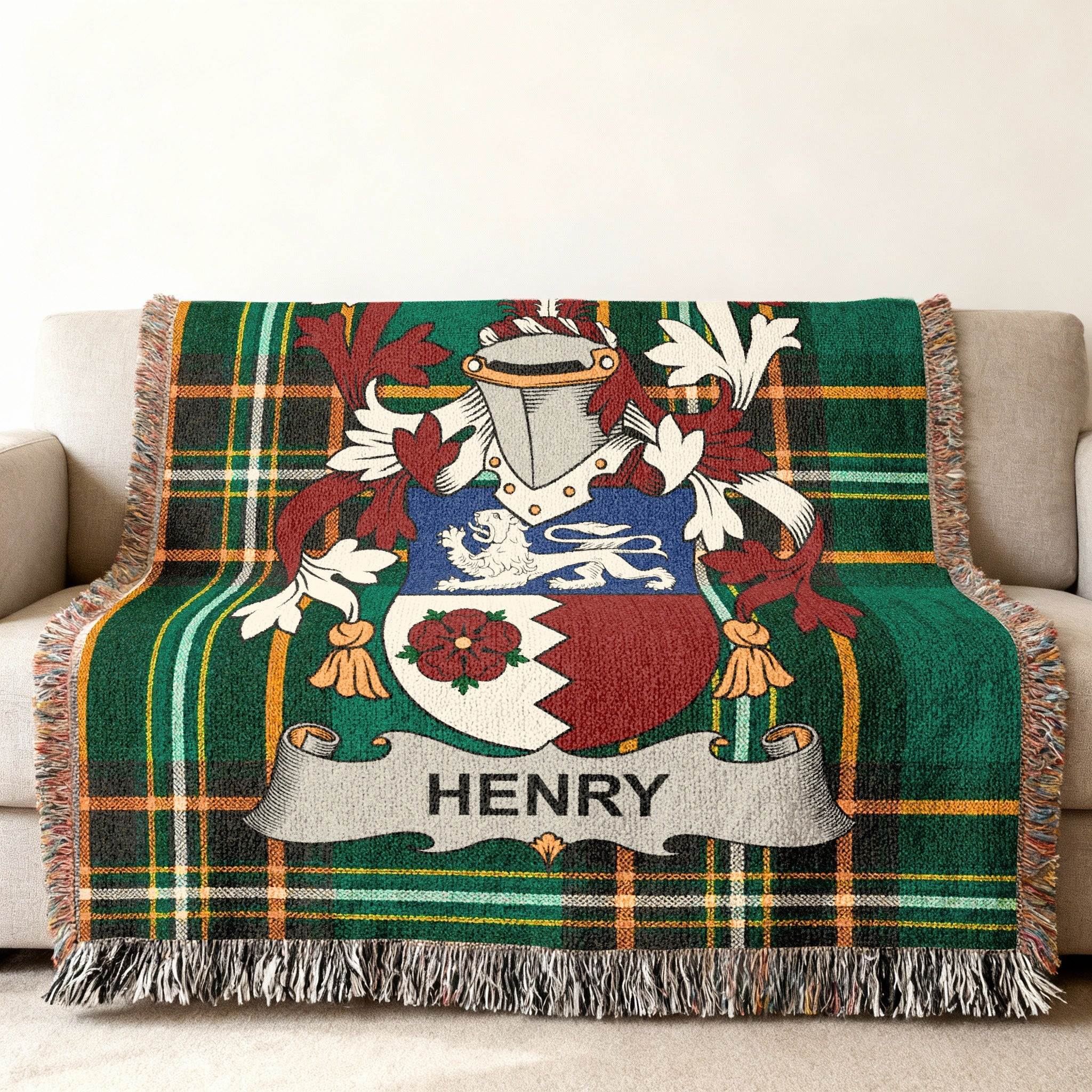 Green plaid throw blanket with a family crest featuring the name "HENRY".