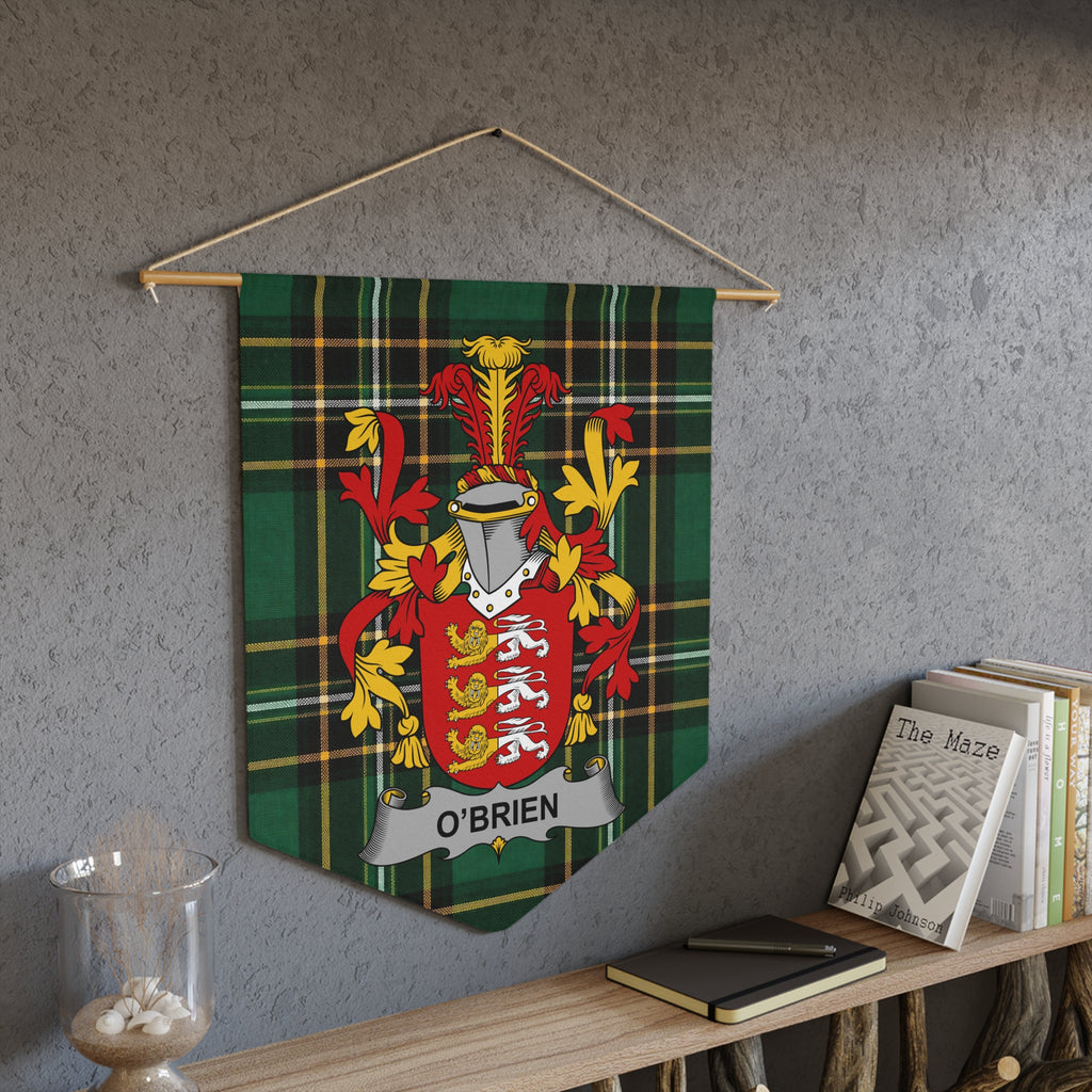 O'Brien family crest on a green tartan pennant banner hanging on a wall.