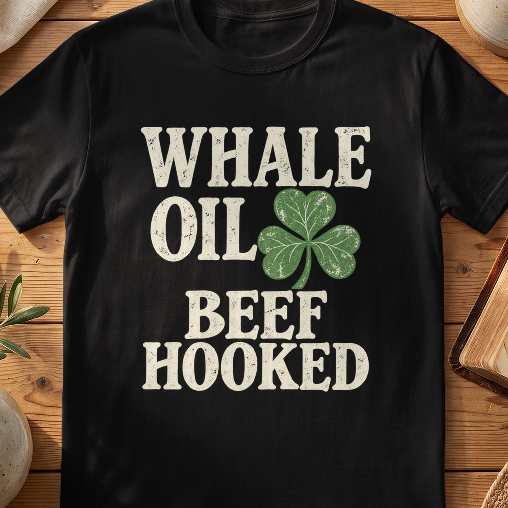 Black T-shirt with “Whale Oil Beef Hooked” text and distressed shamrock graphic.