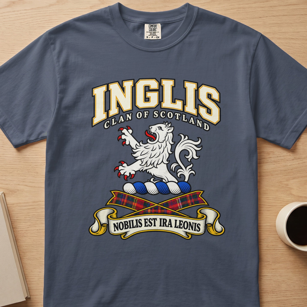 Inglis clan crest with white lion on a slate blue Comfort Colors T-shirt, front view
