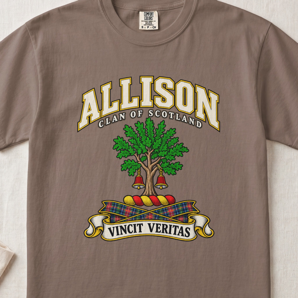 Allison Scottish clan T-shirt in Espresso, front view with a green tree with two hanging bells and motto banner.
