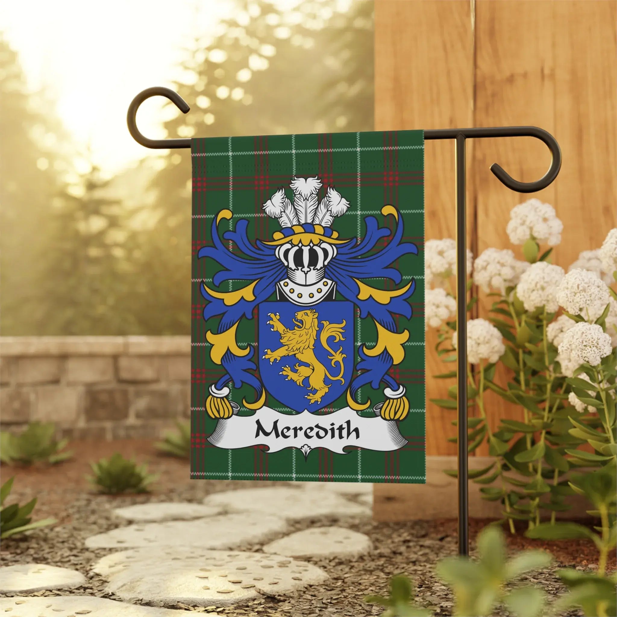 Meredith family crest on plaid flag with white feathers.