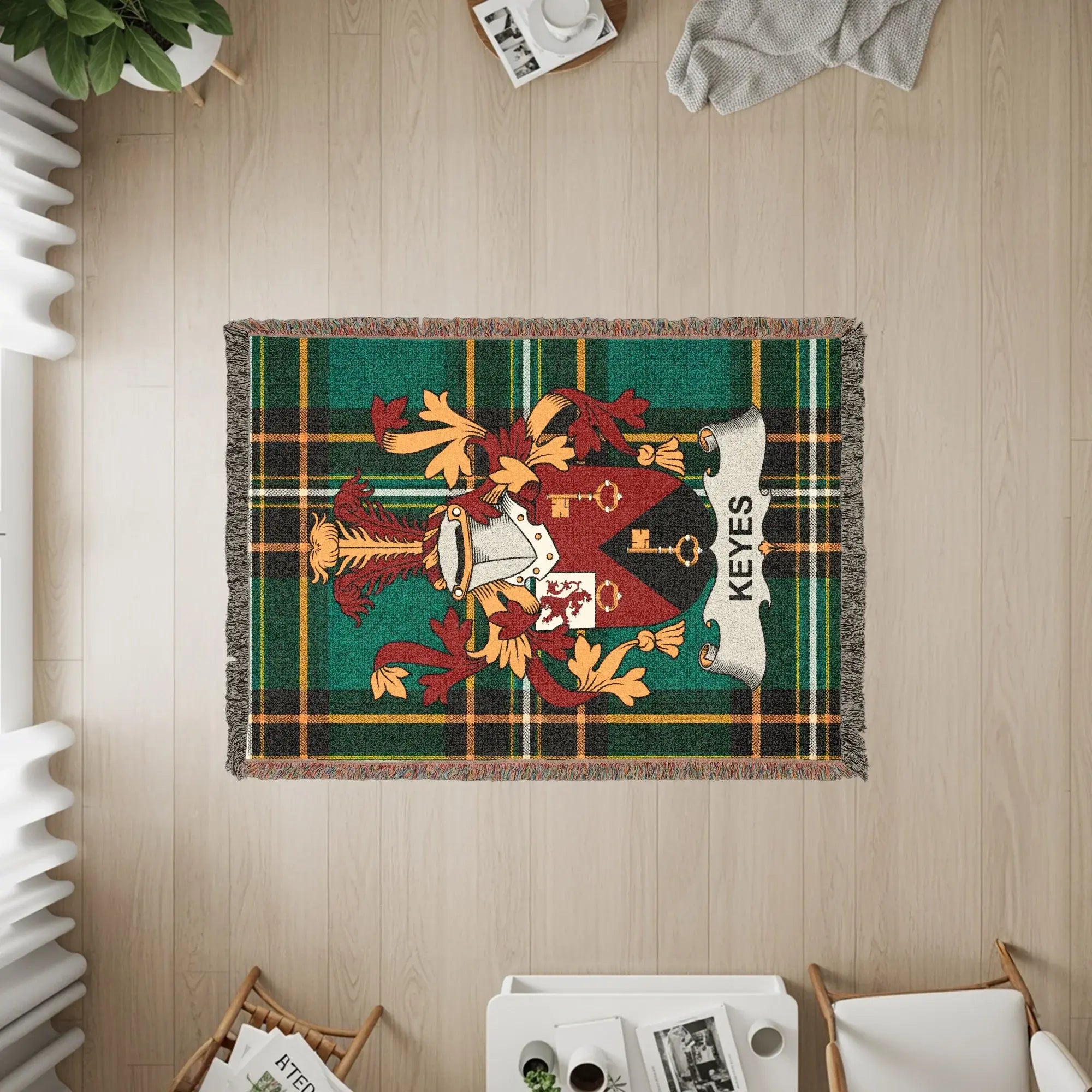 Keyes family crest woven blanket on wooden floor.