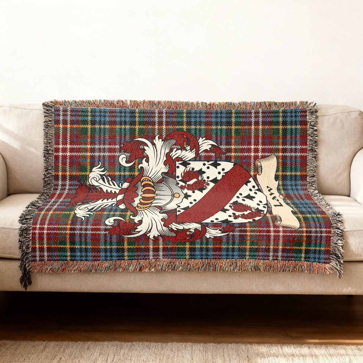 Law Scottish woven blanket with family shield and Caledonia tartan background