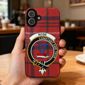 Clan Rose tartan phone case — glossy edge-to-edge red plaid and harp crest print, iPhone shown