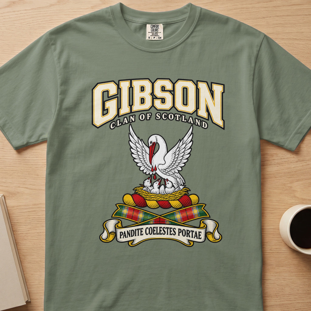 Gibson white bird with lifted wings graphic on a sage green Comfort Colors T-shirt, front view