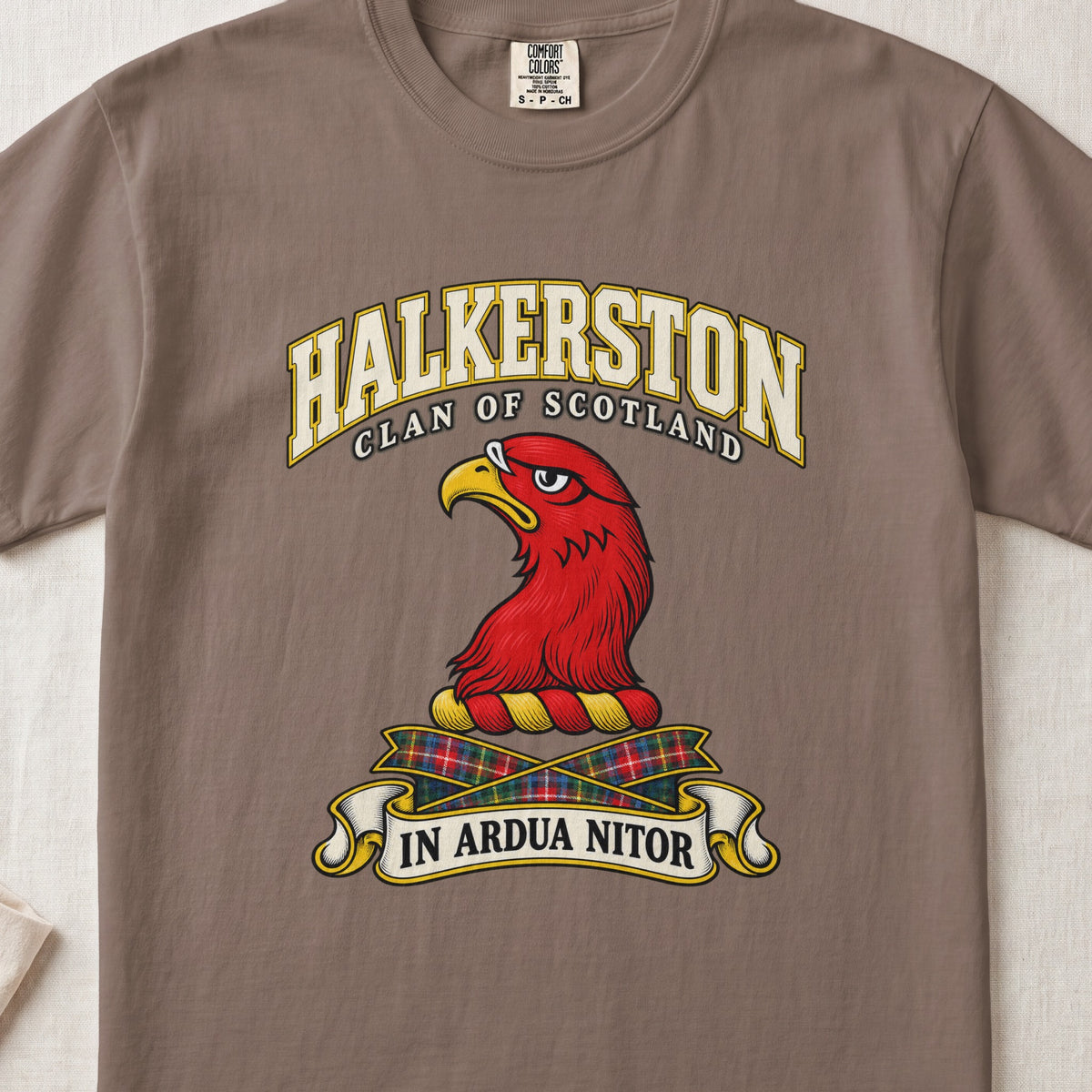 Halkerston Scottish clan T-shirt in Espresso, front view with a red bird head with a golden beak and motto banner.