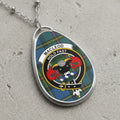 Macleod Hold Fast tartan oval pendant necklace with a ram's head crest.