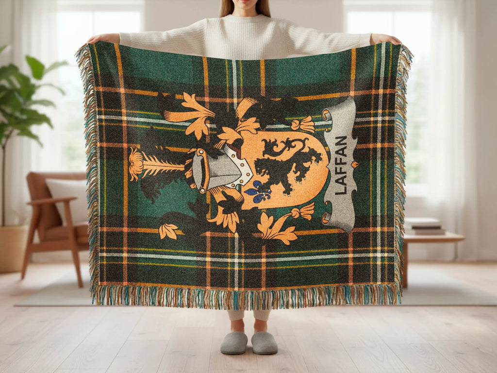 Tartan blanket with Laffan crest and fringe.
