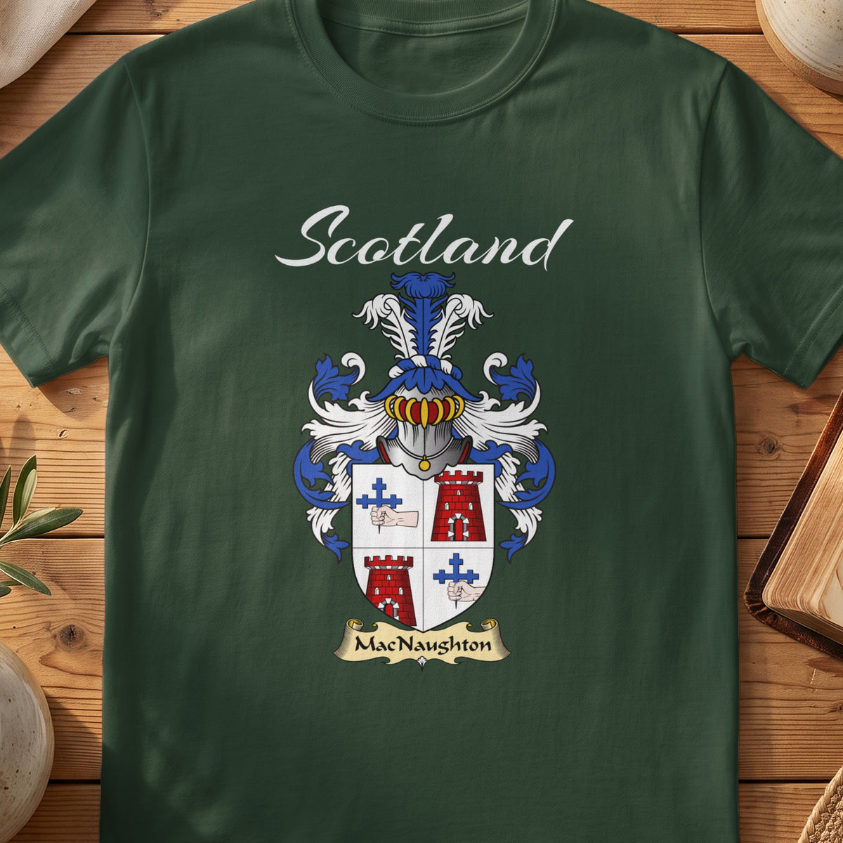 Forest Green MacNaughton Scottish T-shirt featuring a quartered shield with red towers and blue crosses