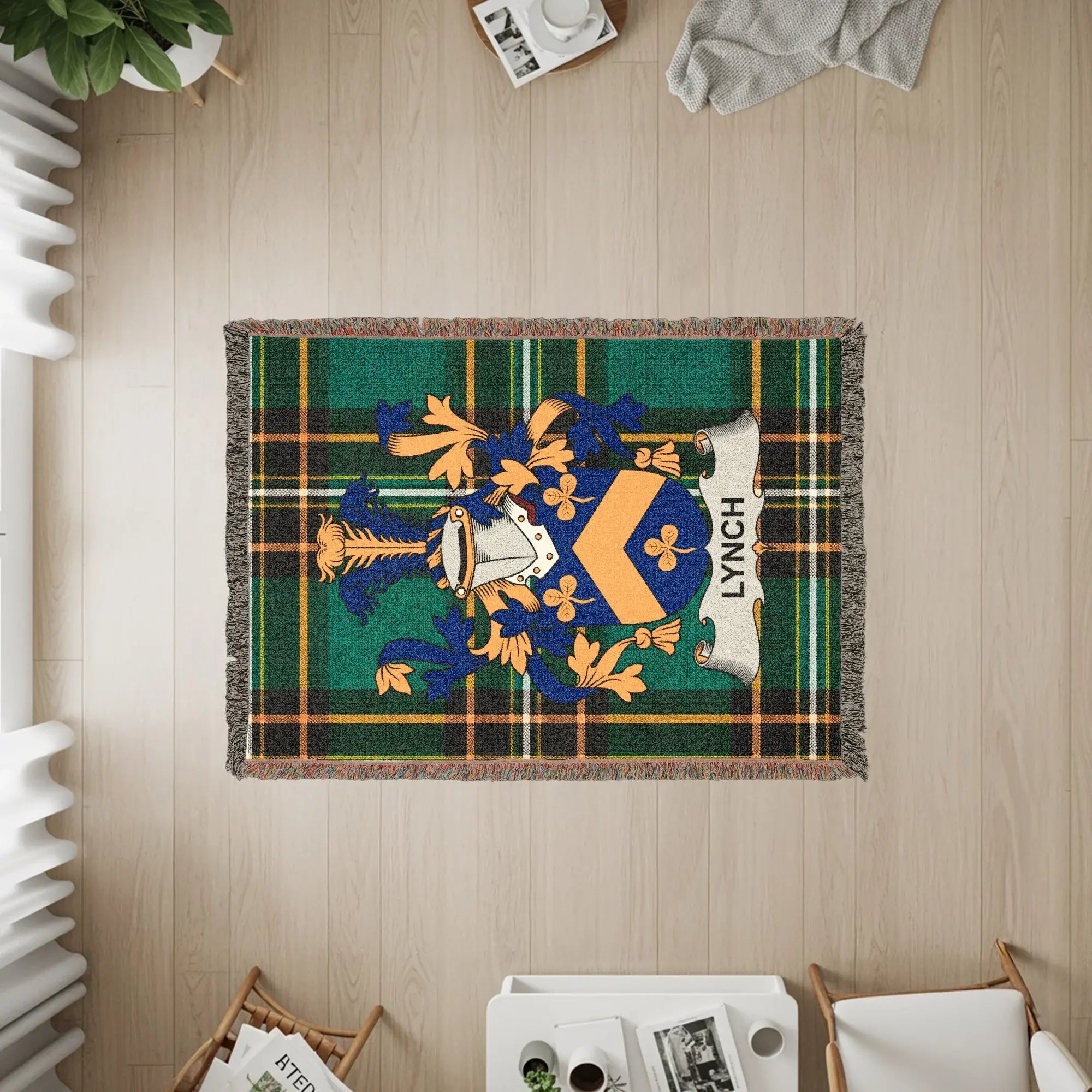 Tapestry throw blanket with Lynch family crest on green and blue plaid.