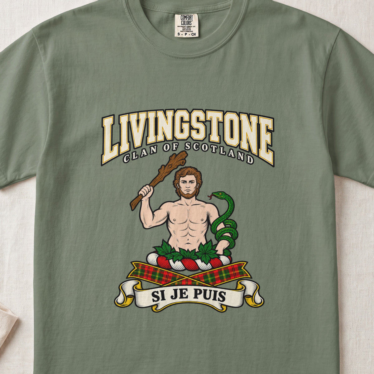 Livingstone graphic T-shirt in Moss green, front flat lay showing varsity lettering and bare-chested man holding a wooden club with a green snake coiled around the other arm.